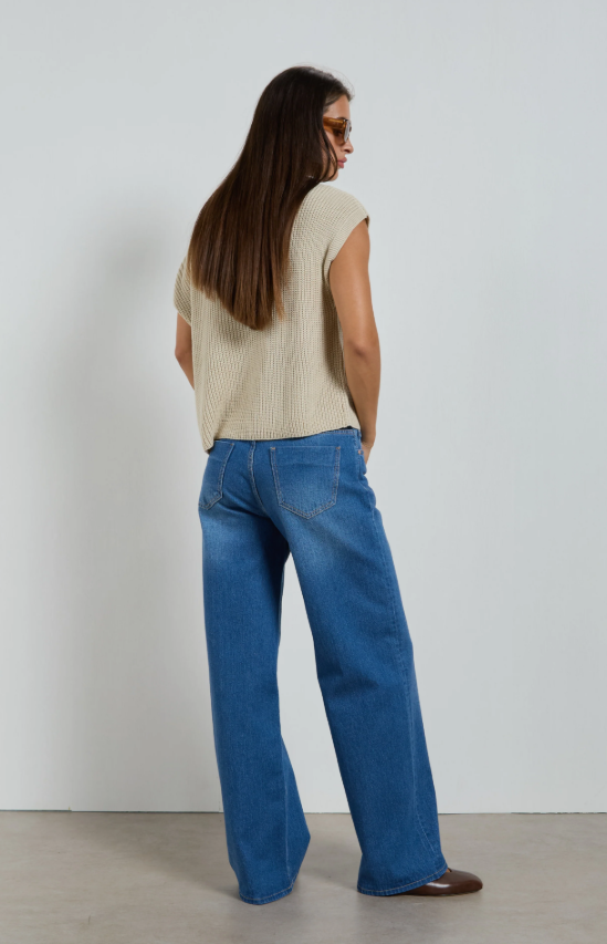 Dricoper Zelda jeans in Rodeo Blue, designed with a relaxed baggy fit, mid-to-high rise waist, and wide loose legs that fall to the floor for a laid-back ’90s-inspired look.