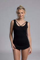 The NES Lattice Singlet is a must-have essential for every wardrobe. Crafted from a soft, stretchy knit that's not see-through, this versatile piece can be worn as an undergarment for smooth layering or styled as a top for a chic, minimalist look. Featuring fine lattice strap detailing and a reversible design, you get two stylish options in one.