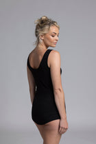 The NES Lattice Singlet is a must-have essential for every wardrobe. Crafted from a soft, stretchy knit that's not see-through, this versatile piece can be worn as an undergarment for smooth layering or styled as a top for a chic, minimalist look. Featuring fine lattice strap detailing and a reversible design, you get two stylish options in one.